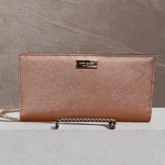 kate spade Handbags - NEW kate spade Metallic Pink Rose Gold Wallet Logo Plaque Stacey Laurel Way NWT